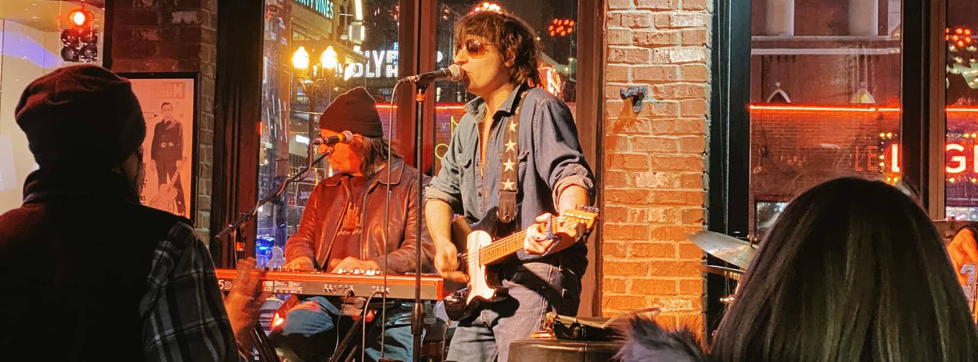 bar singer on guitar in Greenville